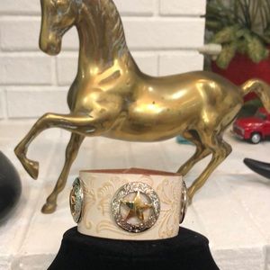 Embossed leather cuff bracelet, star Conchos